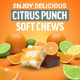 Citrus punch Liver Detox+ soft chews wrapped and unwrapped surrounded by oranges, limes, and lemons on orange background.