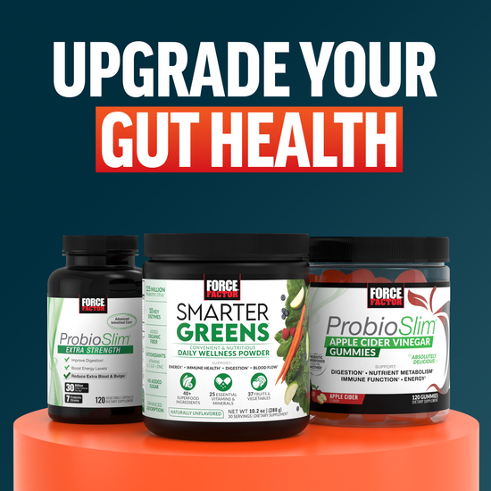 Three Force Factor gut health products—ProbioSlim Extra Strength, Smarter Greens, and Apple Cider Vinegar Gummies—on a red pedestal.