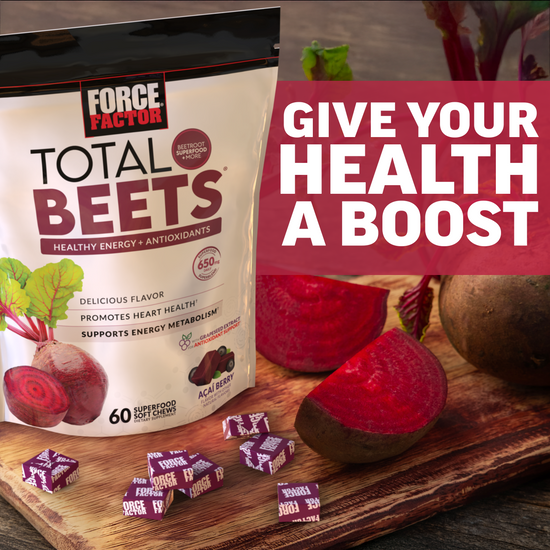 Force Factor Total Beets soft chews bag with açaí berry soft chews and fresh beets on wooden cutting board