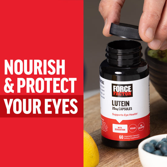 Lutein supplement bottle with text promoting eye health and protection, surrounded by fresh fruits on a wooden table.