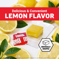Individually wrapped lemon-flavored Force Factor glutathione soft chews surrounded by fresh lemons