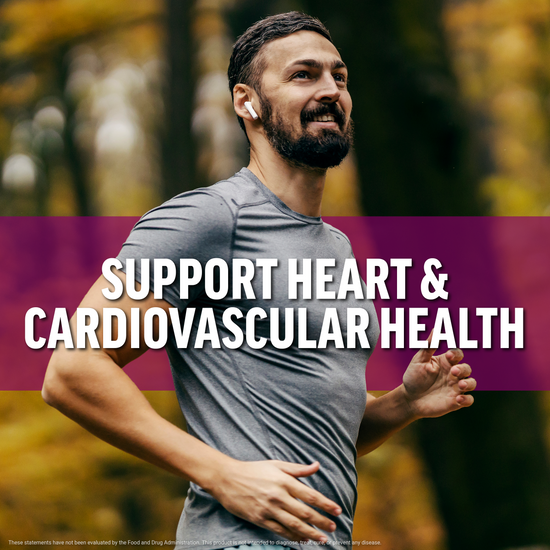 Man smiling while jogging outdoors, supporting heart and cardiovascular health