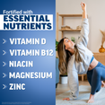Woman stretching at home with text showing supplement fortified with essential nutrients including vitamin D, B12, niacin, magnesium, and zinc