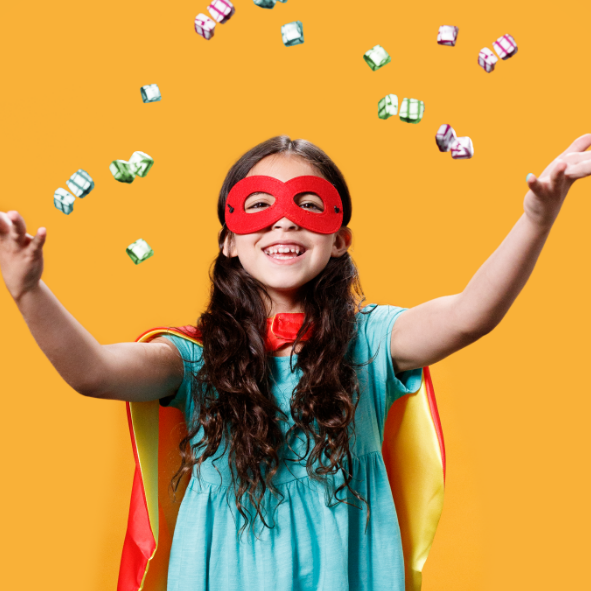 Young boy holding Force Factor Kids Superfoods, Force Factor Kids Multivitamin, and Force Factor Kids Immunity Super Chews.