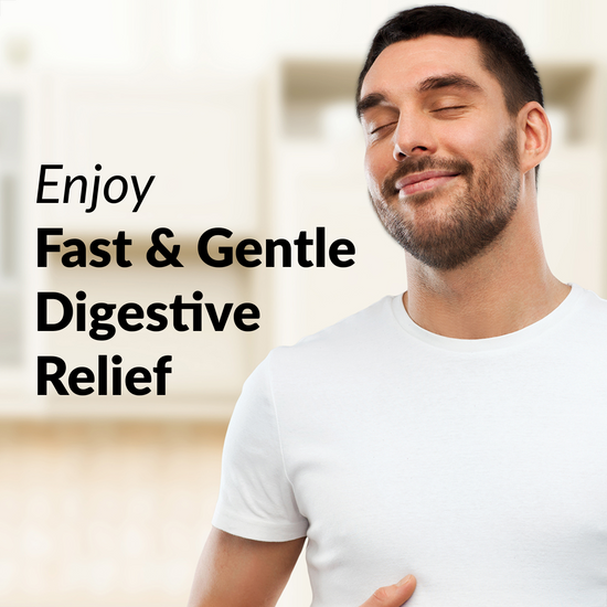 Smiling man in a white shirt promoting fast and gentle digestive relief.