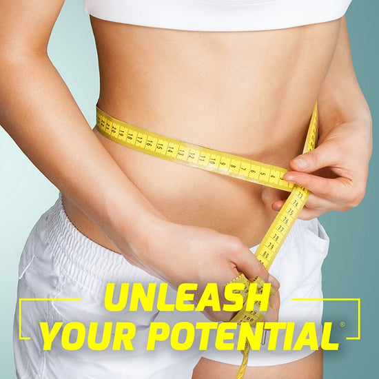 Woman measuring her waist with a yellow tape measure, promoting health and fitness.
