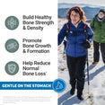 Two older hikers smiling in snowy mountains, promoting bone strength, growth, and reduced bone loss, gentle on the stomach