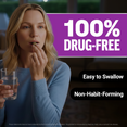 Woman taking sleep tablet with water beside bold claim 100% drug-free, easy to swallow, non-habit-forming.