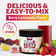Total Beets Energy berry lemonade tub with raspberries and lemon beside a glass of beet drink and no-sugar icon.