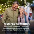 Older couple laughing together outdoors, promoting calcium citrate formula that's gentle on the stomach