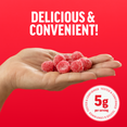 Hand holding gummy supplements with bold text: "Delicious & Convenient!" and "5g per serving" on a red background.