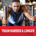 Muscular man pushing sled at gym with text train harder and longer
