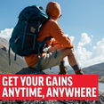 Hiker resting on mountain with backpack holding creatine sticks, bold text reading get your gains anytime, anywhere.