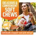 Woman holding soft chew and bottle outdoors, labeled individually wrapped.
