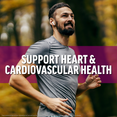 Man smiling while jogging outdoors, supporting heart and cardiovascular health
