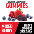 Mixed berry flavored Force Factor gummies shown with blueberries, raspberries, and strawberries; daily serving is two gummies.