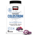 Bottle of Awesome Colostrum with soft chews, promoting immune health, gut health, and vibrant hair and skin.