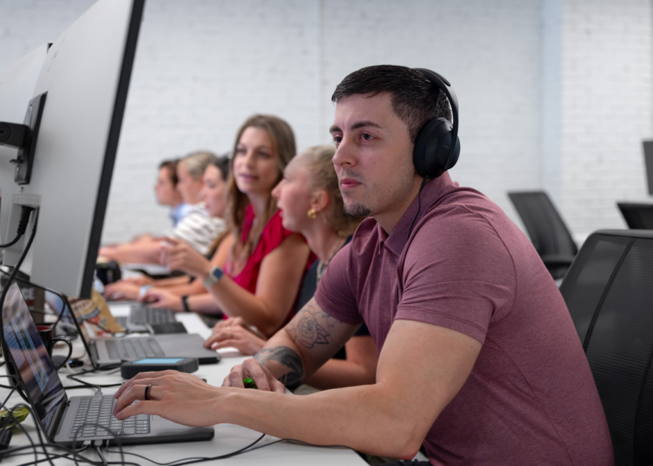 Force Factor Employees Having a Meeting